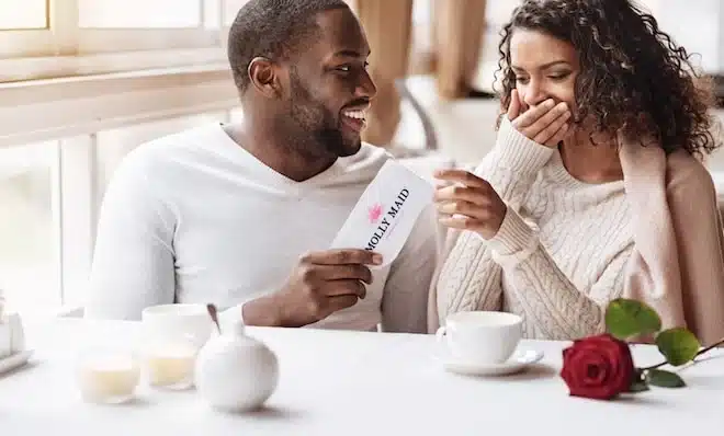 Couple receiving a Molly Maid gift certificate