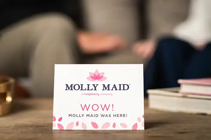 A “Molly Maid Was Here” card left on a table after a commercial occasional cleaning appointment.