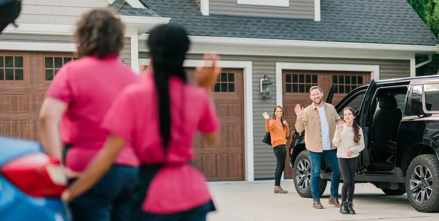 Molly Maid Employees leaving a home.