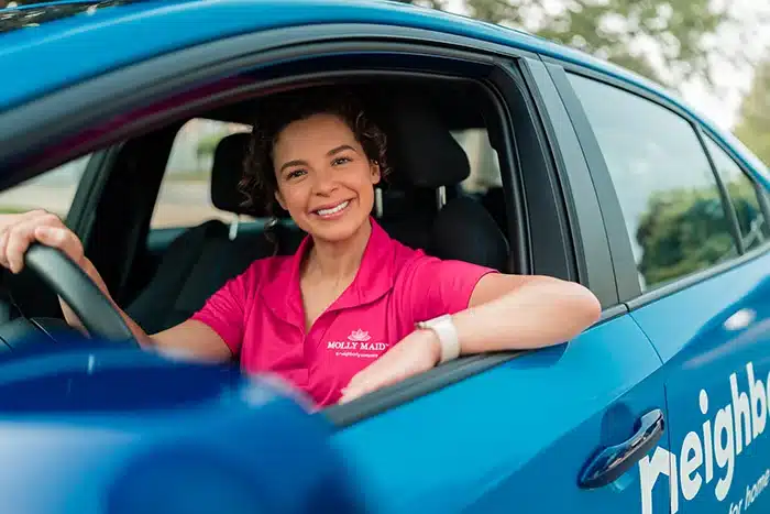 A Molly Maid professional headed to a commercial one-time cleaning appointment