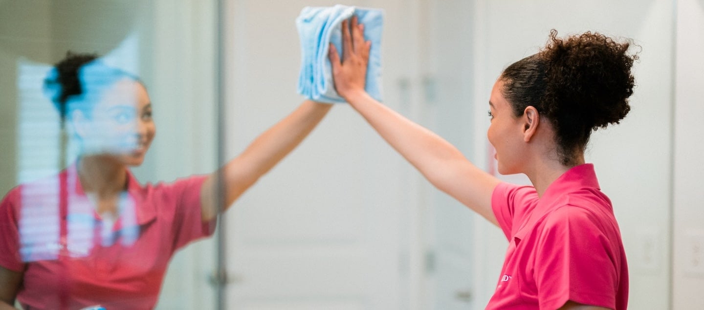 Maid conducting a one time cleaning service.